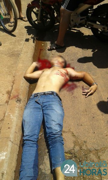 Jovem é assassinado em frente a estabelecimento no Santa Clara Foto174